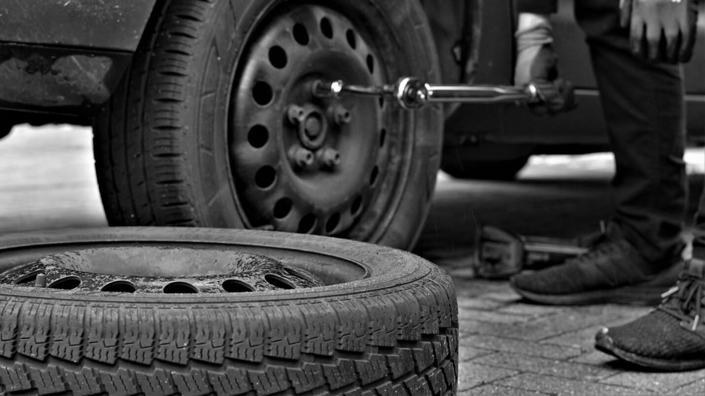 Tyres next to a car